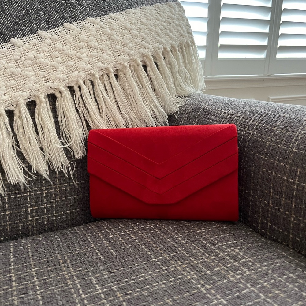 Red sued evening bag, goes with the red pumps I have listed